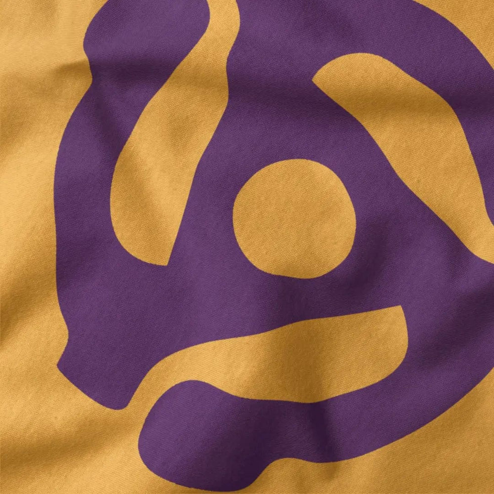 45rpm adapter classic tee in mustard, close-up of the print