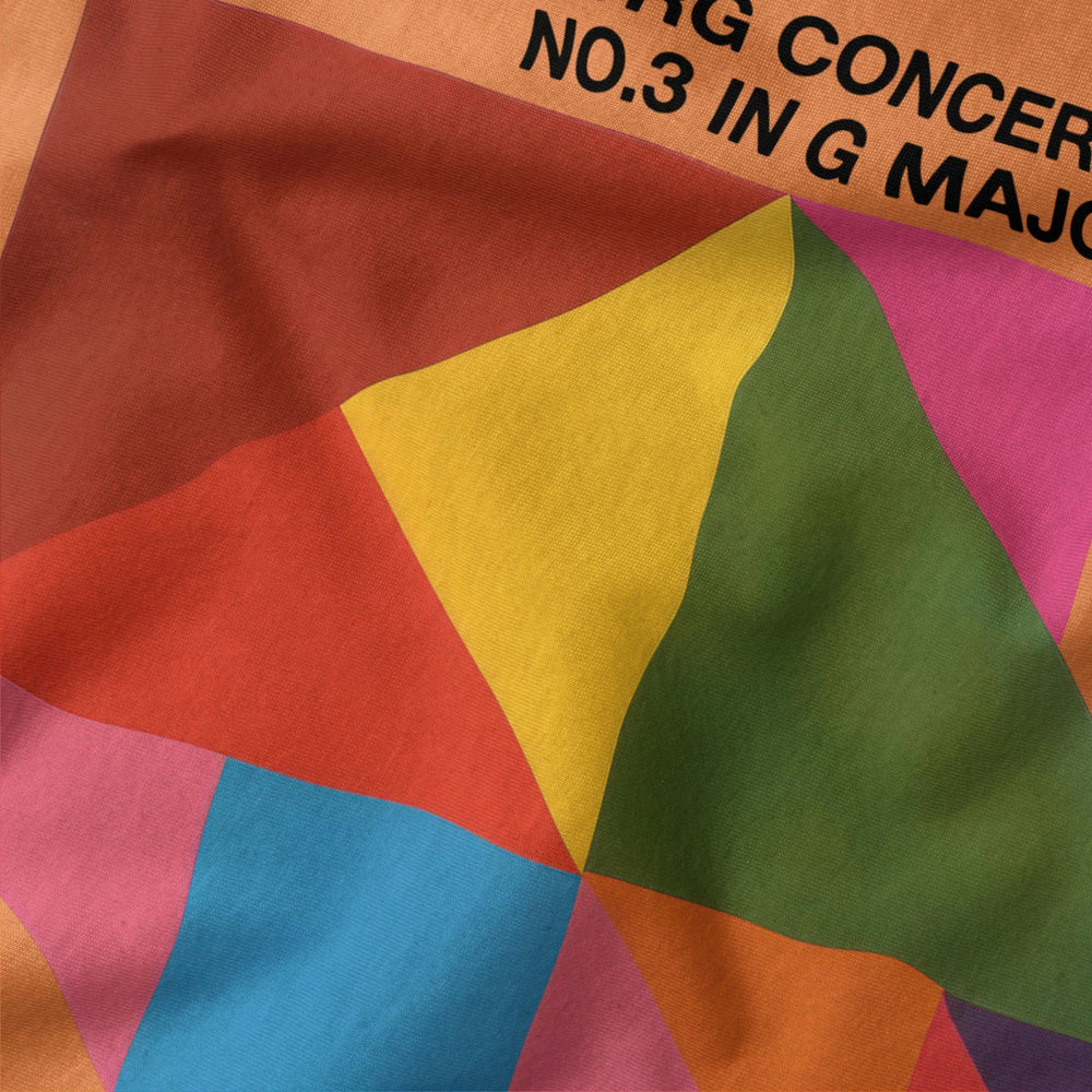 bach: brandenburg concerto no. 3 classic tee in burnt orange, close-up of the print