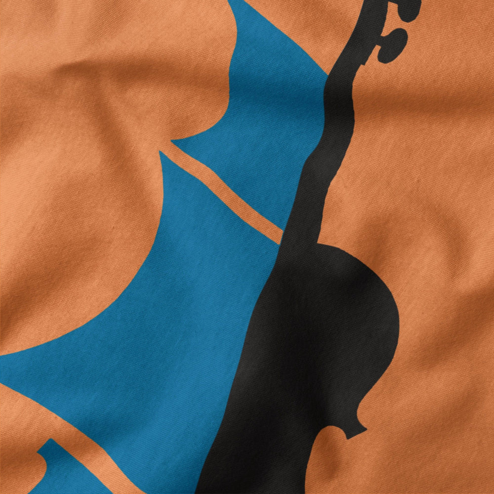sea of song classic tee in burnt orange, close-up of the print