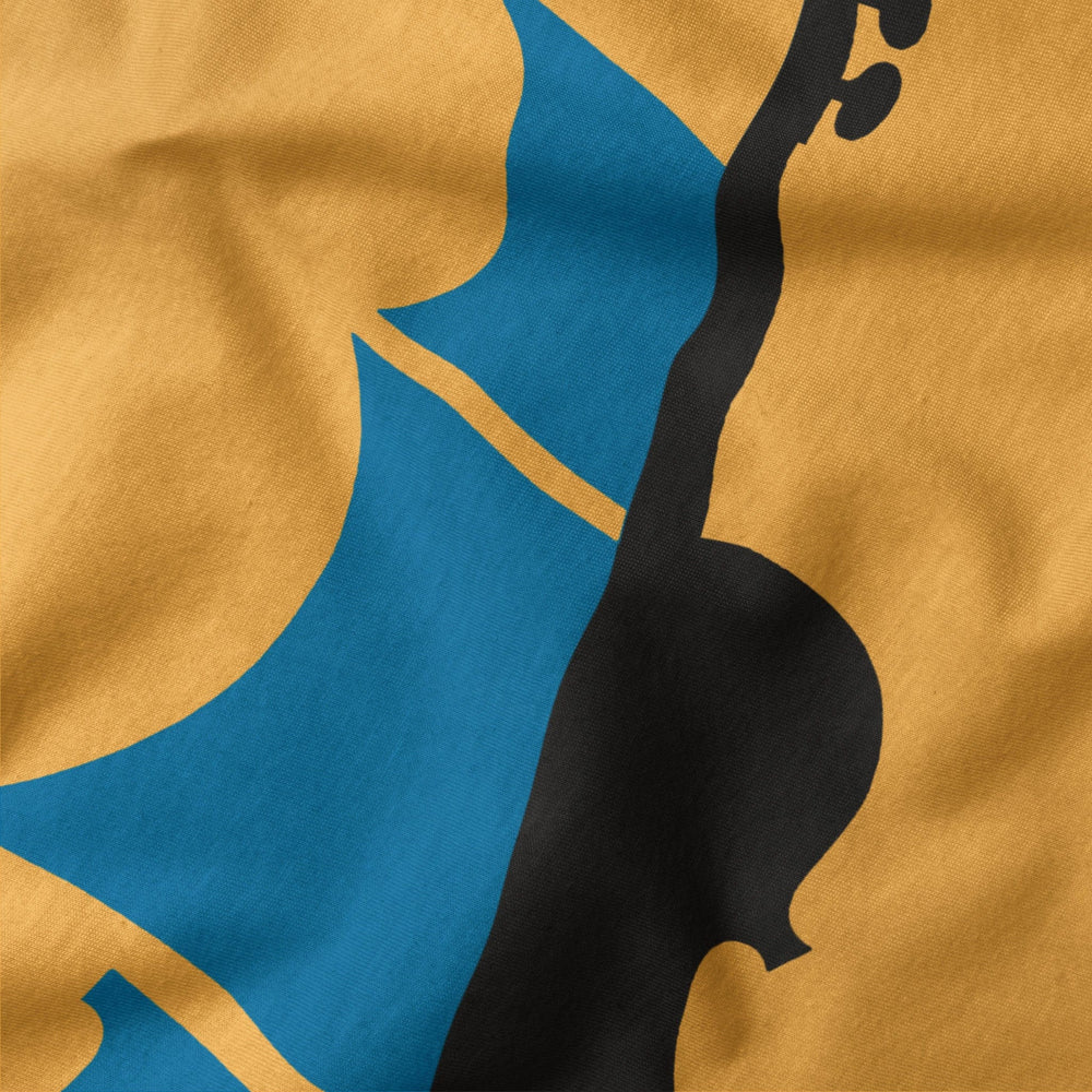 sea of song classic tee in mustard, close-up of the print