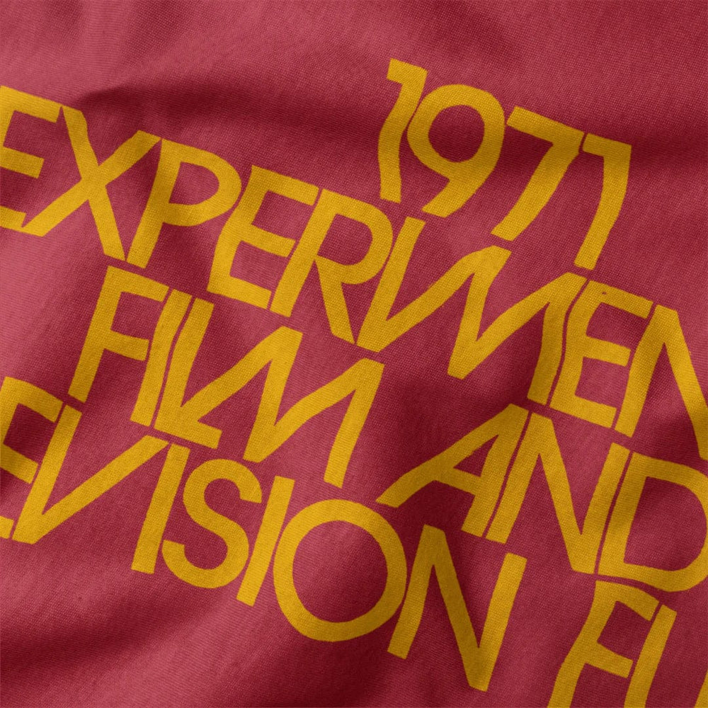 experimental film & television fund classic tee in canvas red, close-up of the print