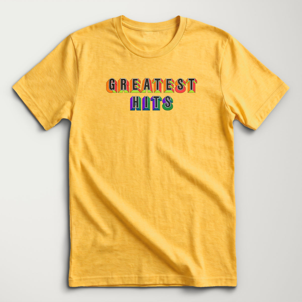 Greatest Hits Classic Tee in Heather Yellow Gold, flat lay