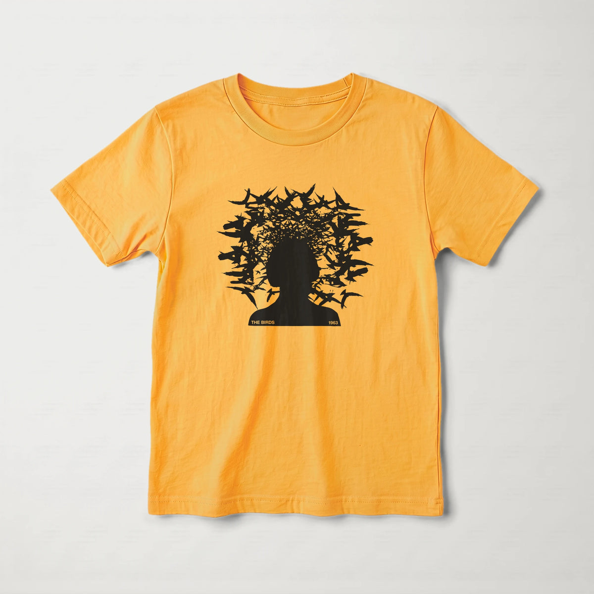 hitchcock: the birds 1963 kids classic tee in gold, laid flat