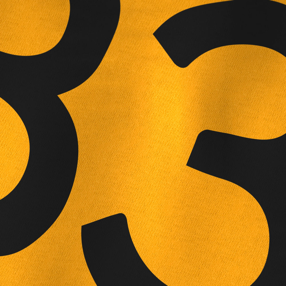 john cage: 4'33" kids classic tee in gold, close-up of the print