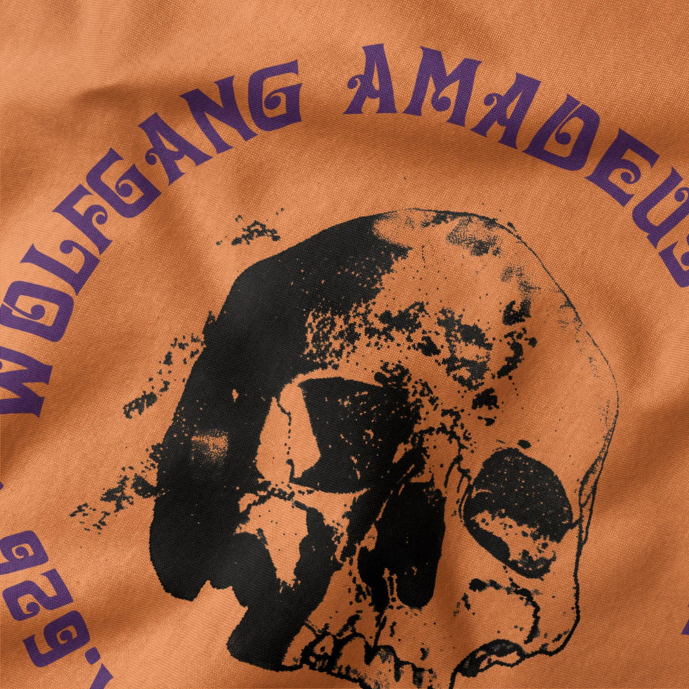 mozart: requiem classic tee in burnt orange, close-up of the print