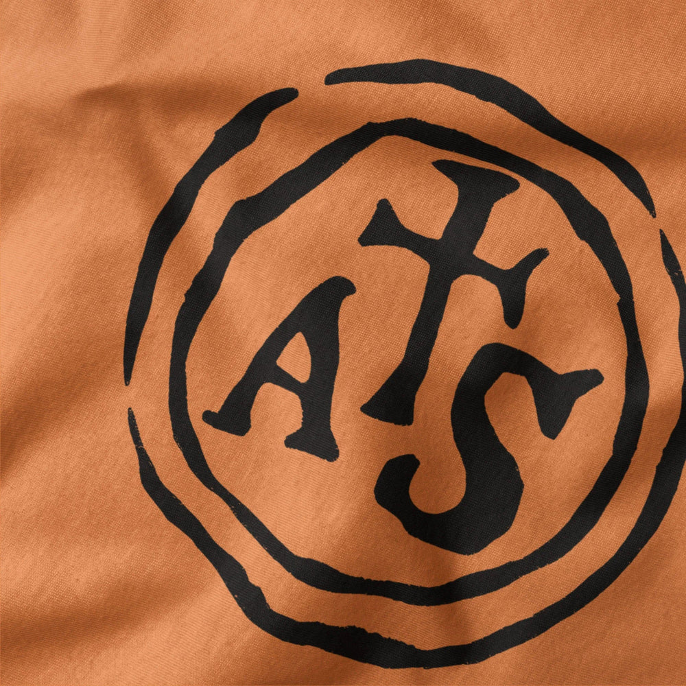 stradivarius: inscription classic tee in burnt orange, close-up of the print