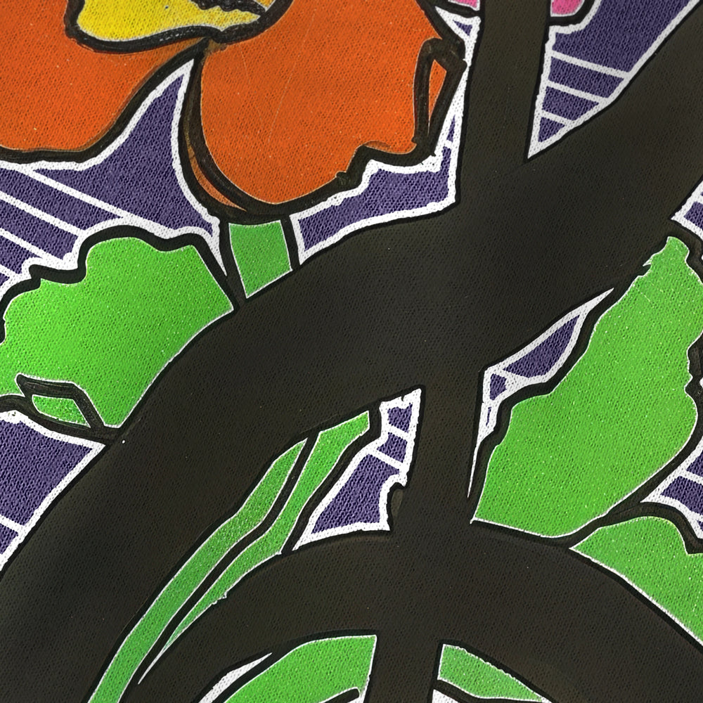 treble clef flower vintage heavyweight tee in grape, close-up of the print