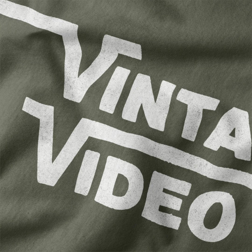 vintage video classic tee in military green, close-up of the print